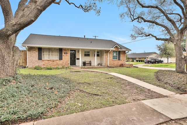 ranch-style house with a front lawn