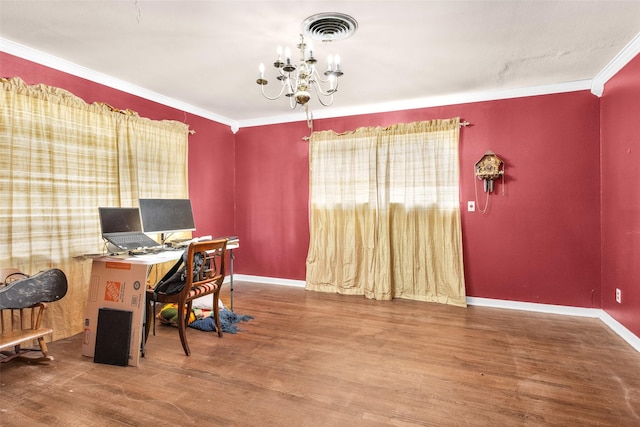 home office featuring crown molding, hardwood / wood-style flooring, and a notable chandelier