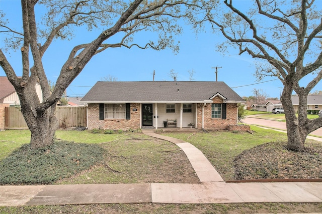 ranch-style house with a front yard