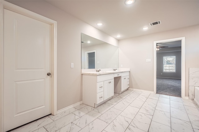 bathroom with vanity and ceiling fan