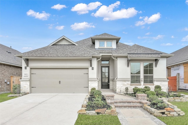 prairie-style home with a garage