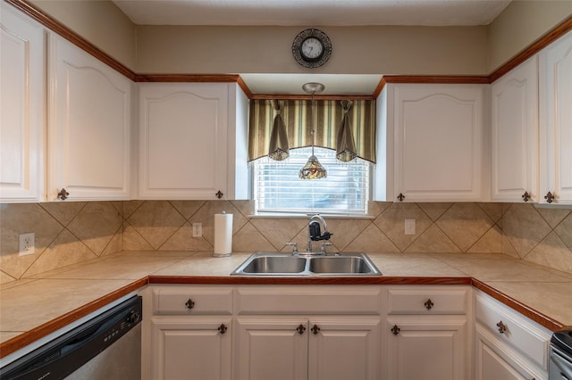 kitchen featuring white cabinetry, sink, and dishwasher