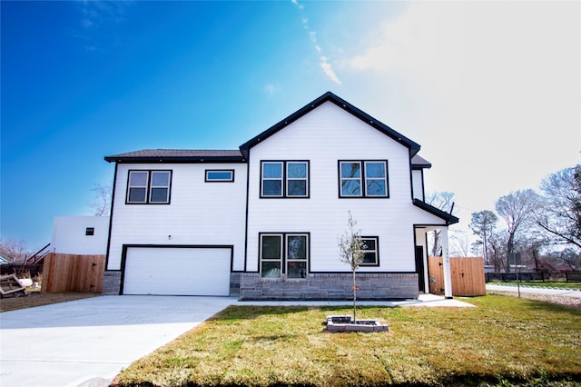 exterior space with a garage and a front yard