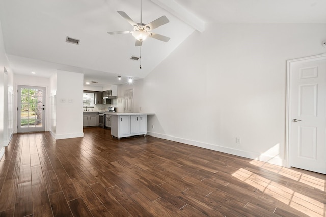 unfurnished living room with ceiling fan, high vaulted ceiling, beamed ceiling, and dark hardwood / wood-style flooring