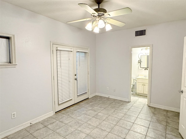 unfurnished bedroom featuring light tile patterned floors, a ceiling fan, visible vents, baseboards, and french doors