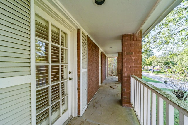 balcony featuring a porch