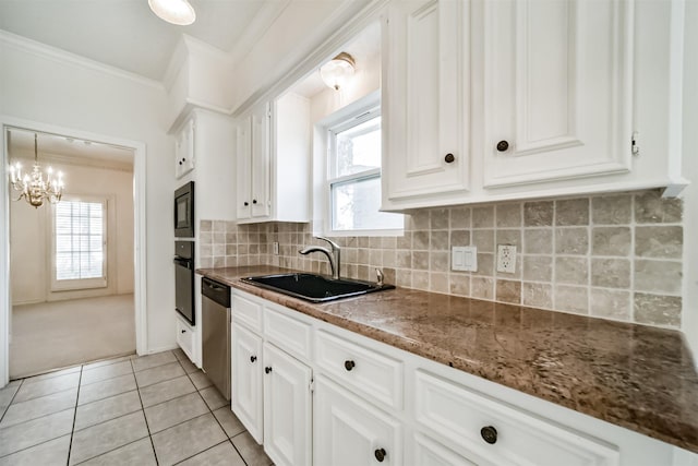 kitchen featuring crown molding, stainless steel dishwasher, sink, and white cabinets