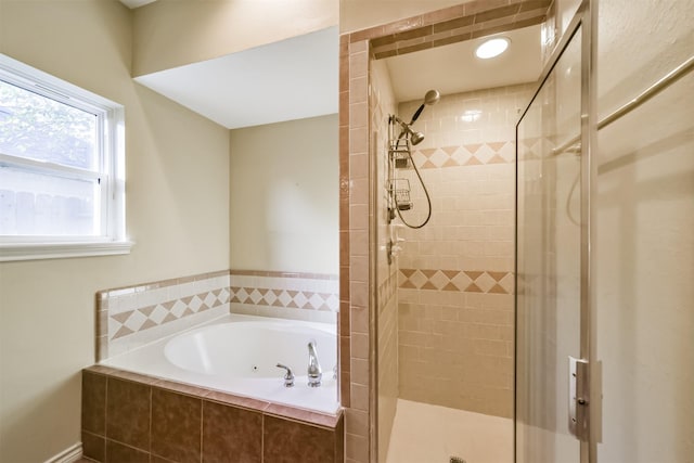 bathroom featuring plus walk in shower