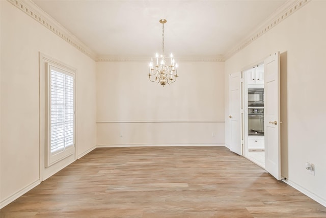 unfurnished room featuring crown molding, a notable chandelier, and light wood-type flooring