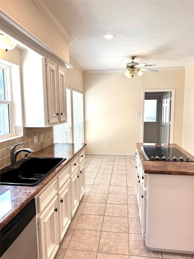 kitchen with sink, crown molding, tasteful backsplash, black electric cooktop, and stainless steel dishwasher