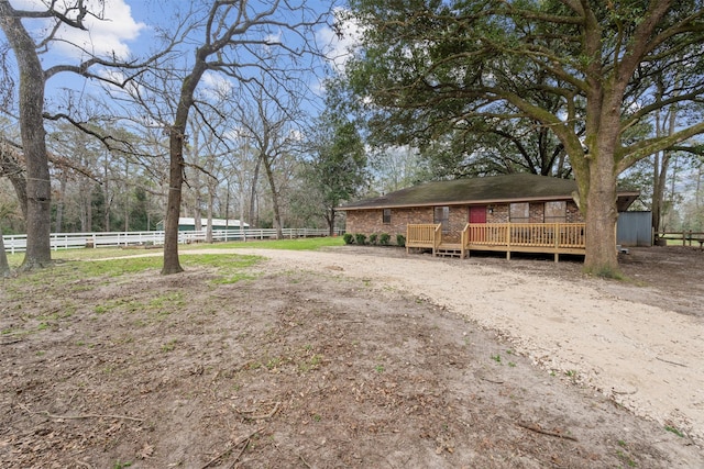 view of front of house featuring a deck