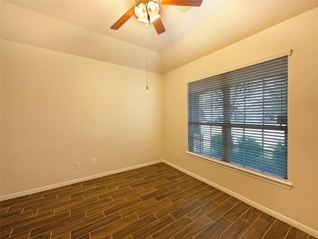 unfurnished room featuring baseboards, a ceiling fan, and wood tiled floor