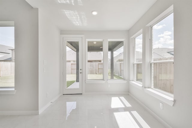 view of unfurnished sunroom