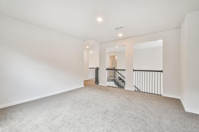 spare room featuring carpet flooring