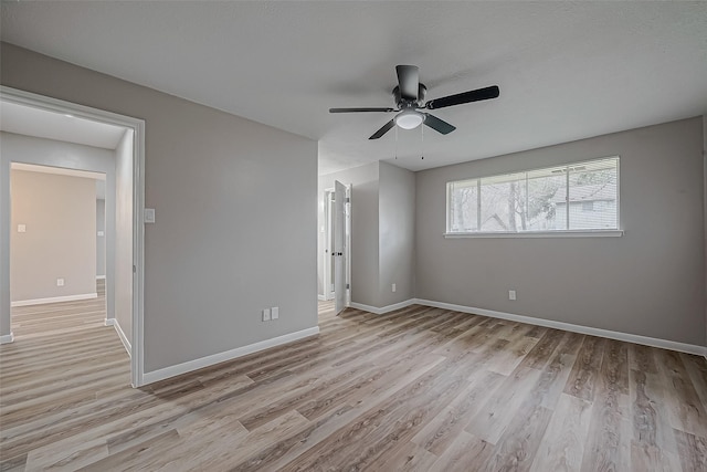 interior space featuring light hardwood / wood-style flooring and ceiling fan