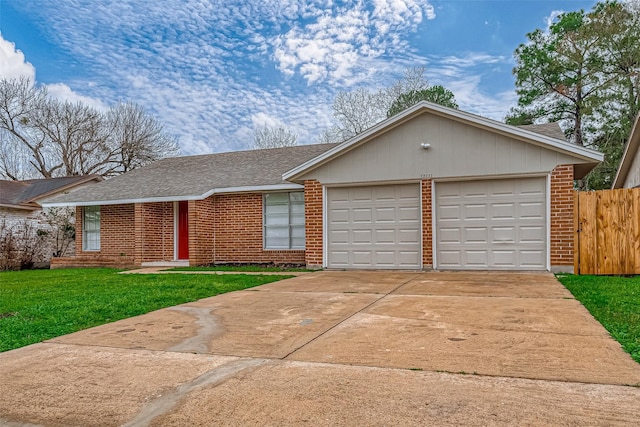 ranch-style home featuring a garage and a front yard