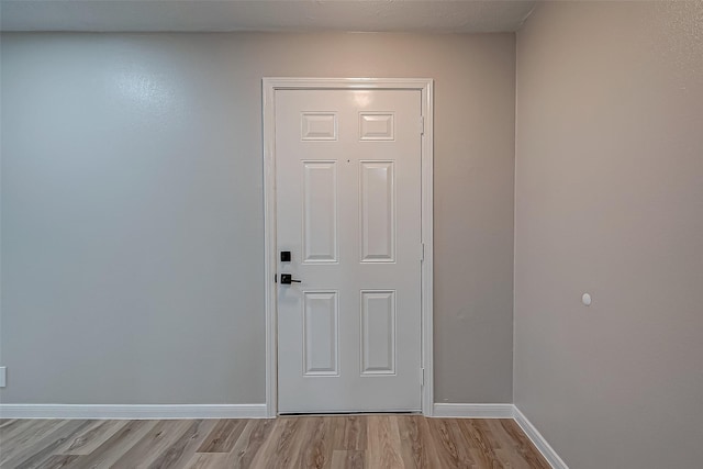 doorway featuring light hardwood / wood-style flooring