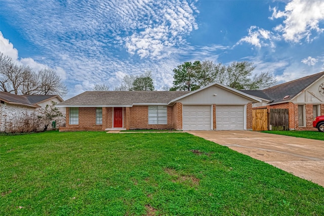 ranch-style home with a garage and a front yard