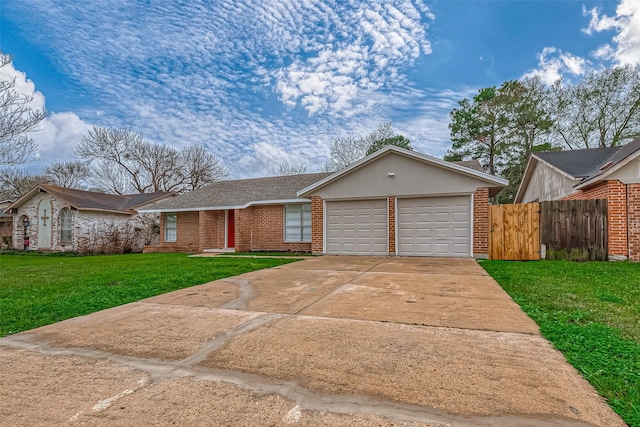 single story home featuring a garage and a front lawn