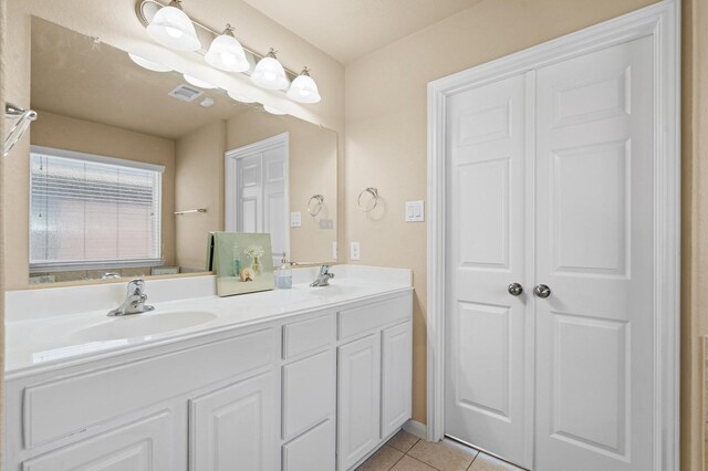 bathroom featuring vanity and tile patterned floors