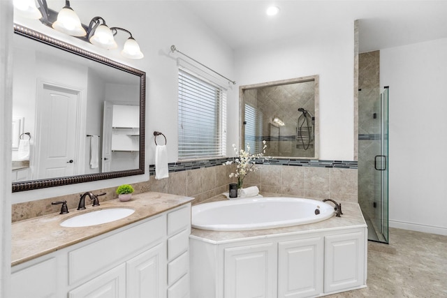 18007 Stari Most Ln, Houston, TX 77044 - full bath featuring a stall shower, a garden tub, and vanity
