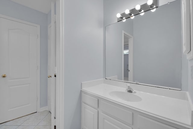 bathroom with vanity and tile patterned flooring