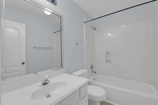 full bathroom featuring vanity, washtub / shower combination, and toilet