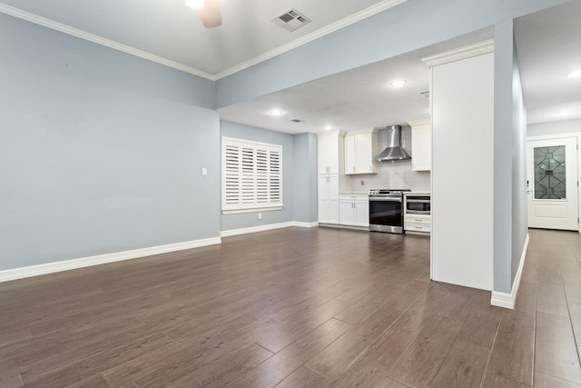 unfurnished living room featuring crown molding, ceiling fan, and dark hardwood / wood-style flooring