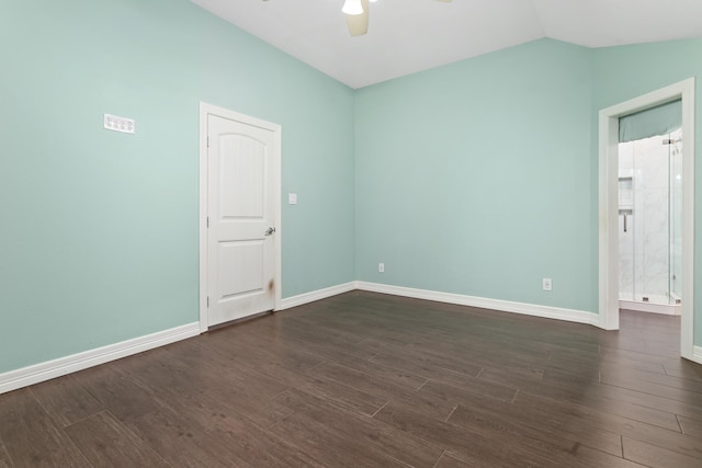 unfurnished room with ceiling fan, dark hardwood / wood-style flooring, and vaulted ceiling