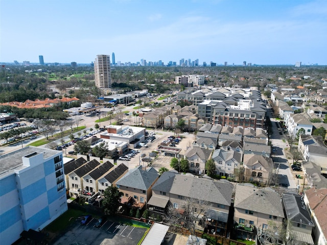 birds eye view of property featuring a view of city