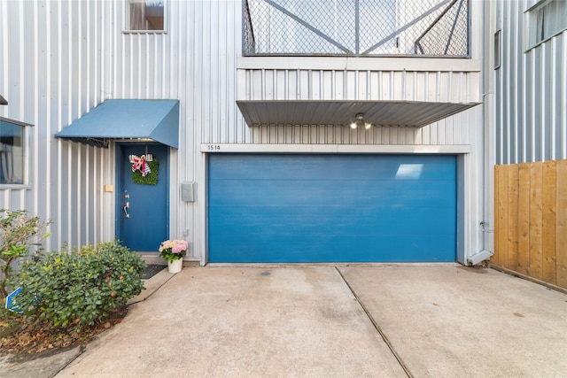 garage featuring driveway