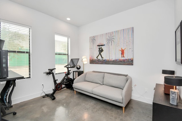 home office with concrete flooring