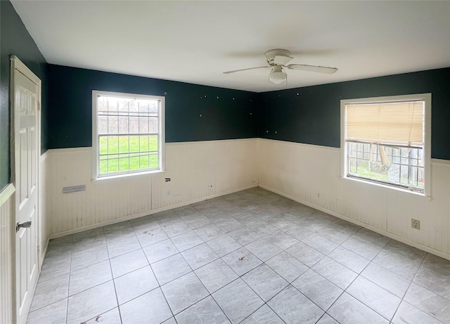 spare room with ceiling fan