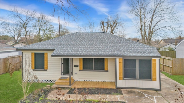 view of front of home with a front yard