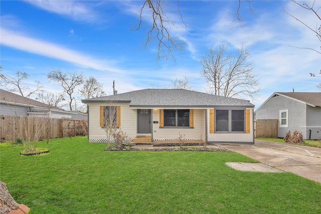 ranch-style house with a front lawn