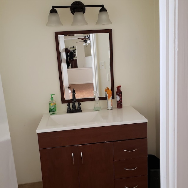 bathroom with vanity and ceiling fan