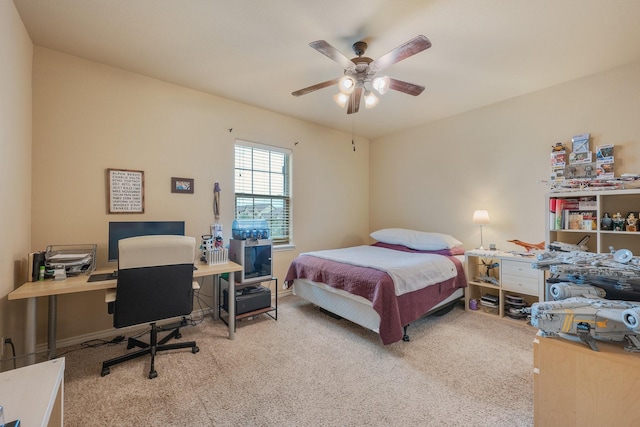 bedroom with ceiling fan and carpet