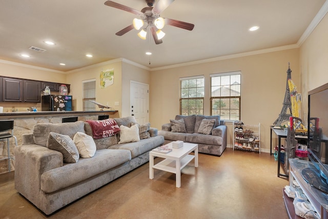 living room featuring crown molding and ceiling fan