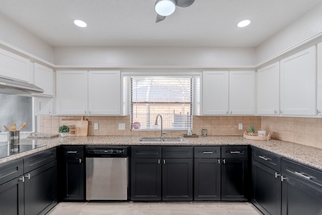 kitchen featuring white cabinetry, dishwasher, sink, black electric stovetop, and light stone counters