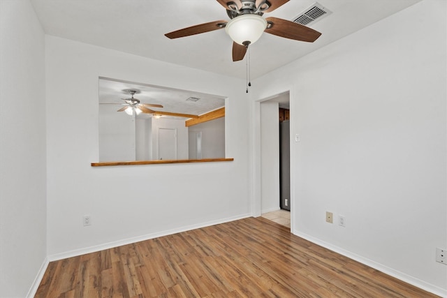 spare room featuring light wood-type flooring