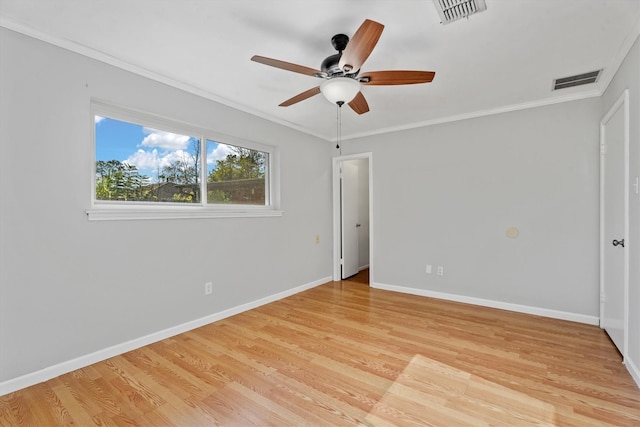 unfurnished bedroom with crown molding, ceiling fan, and light hardwood / wood-style flooring