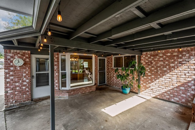 doorway to property with a patio