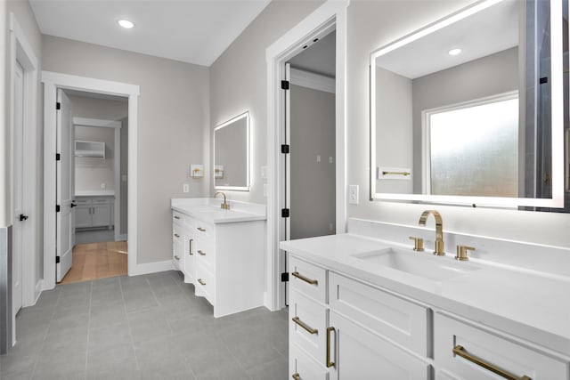 bathroom featuring vanity and tile patterned flooring