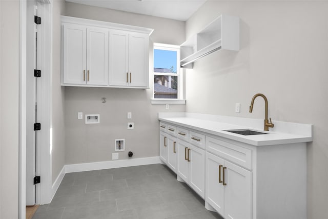 laundry room with sink, hookup for a gas dryer, cabinets, washer hookup, and hookup for an electric dryer