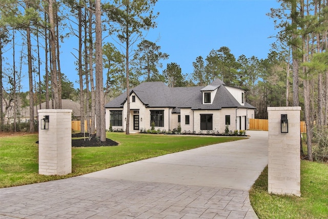 view of front of house with a front lawn