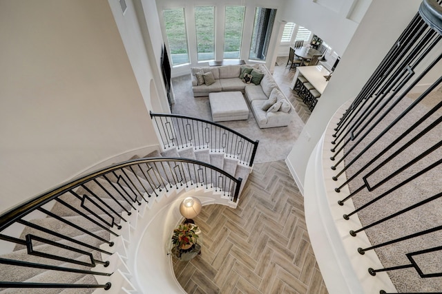 staircase with parquet flooring