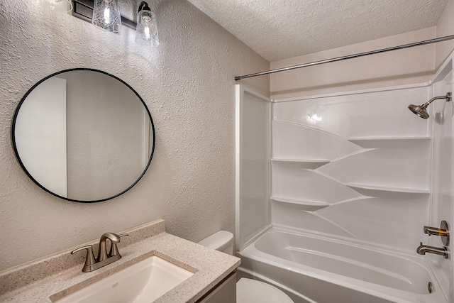 full bathroom featuring vanity, toilet, shower / bath combination, and a textured ceiling