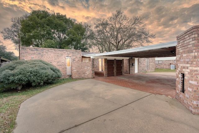 exterior space featuring a carport