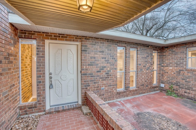 property entrance with a patio