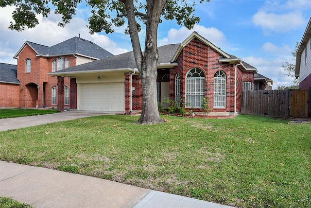 front of property featuring a garage and a front lawn